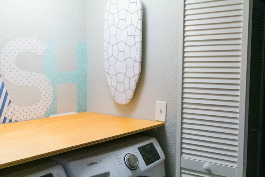 Our Tiny Laundry Room Reveal - You don't need to have a huge space to have a practical and beautiful laundry room! I love this closet laundry room! What a great use of a small space. Great idea for small laundry rooms! 