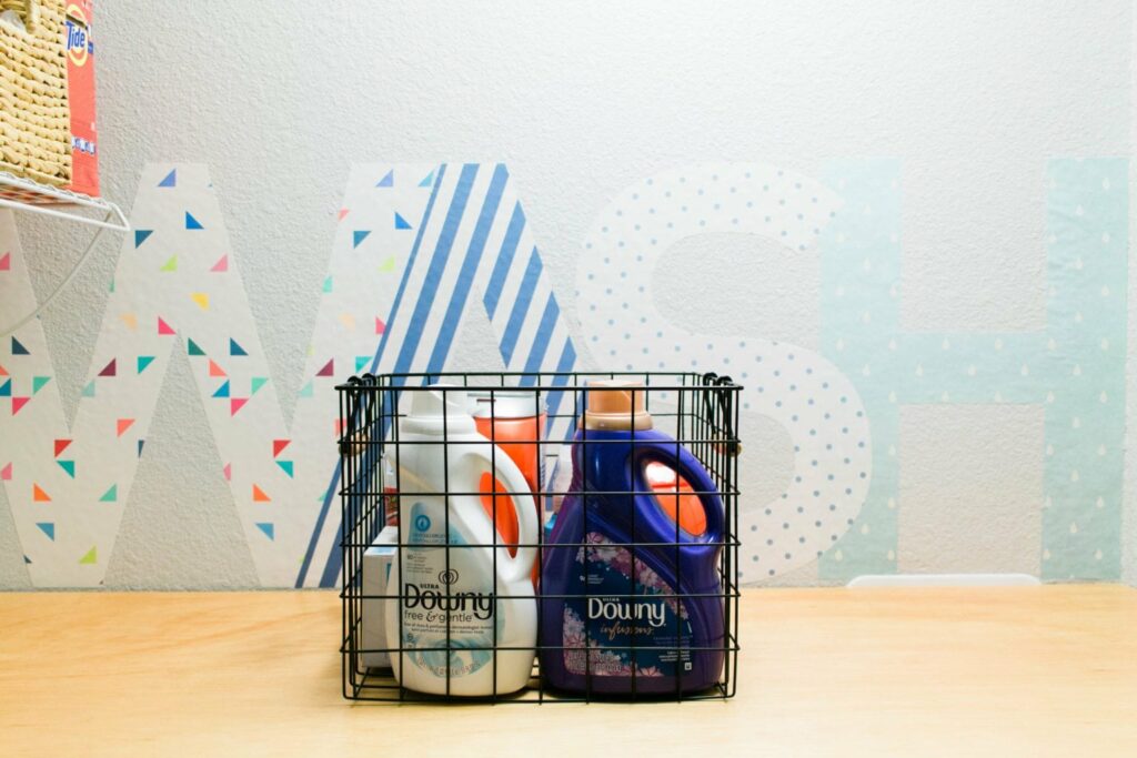 Our Tiny Laundry Room Reveal - You don't need to have a huge space to have a practical and beautiful laundry room! I love this closet laundry room! What a great use of a small space. Great idea for small laundry rooms! 