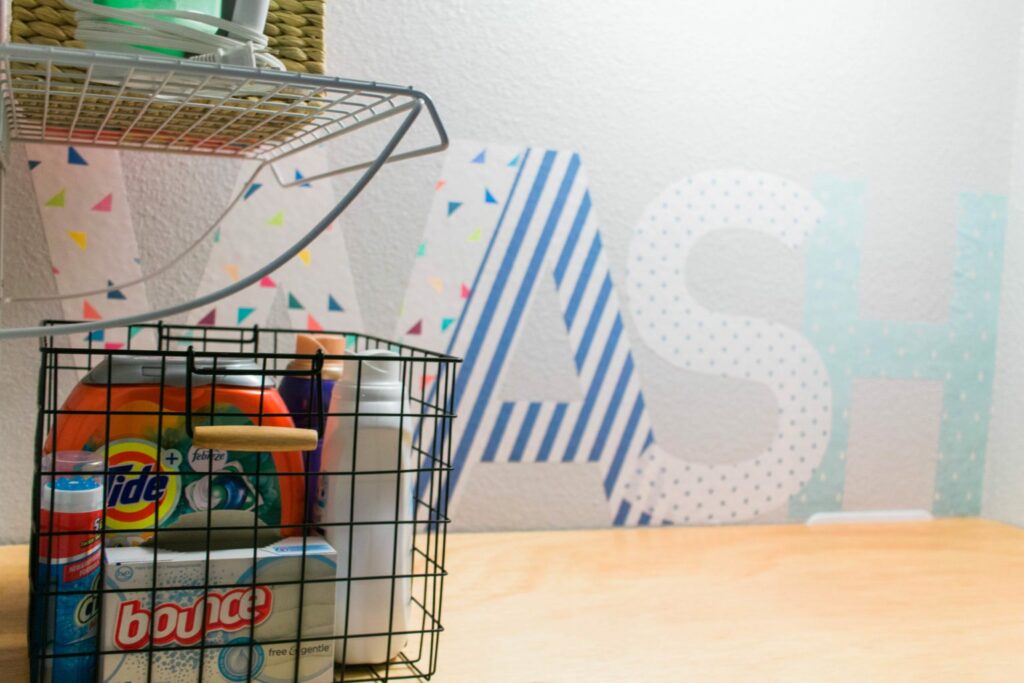 Our Tiny Laundry Room Reveal - You don't need to have a huge space to have a practical and beautiful laundry room! I love this closet laundry room! What a great use of a small space. Great idea for small laundry rooms! 