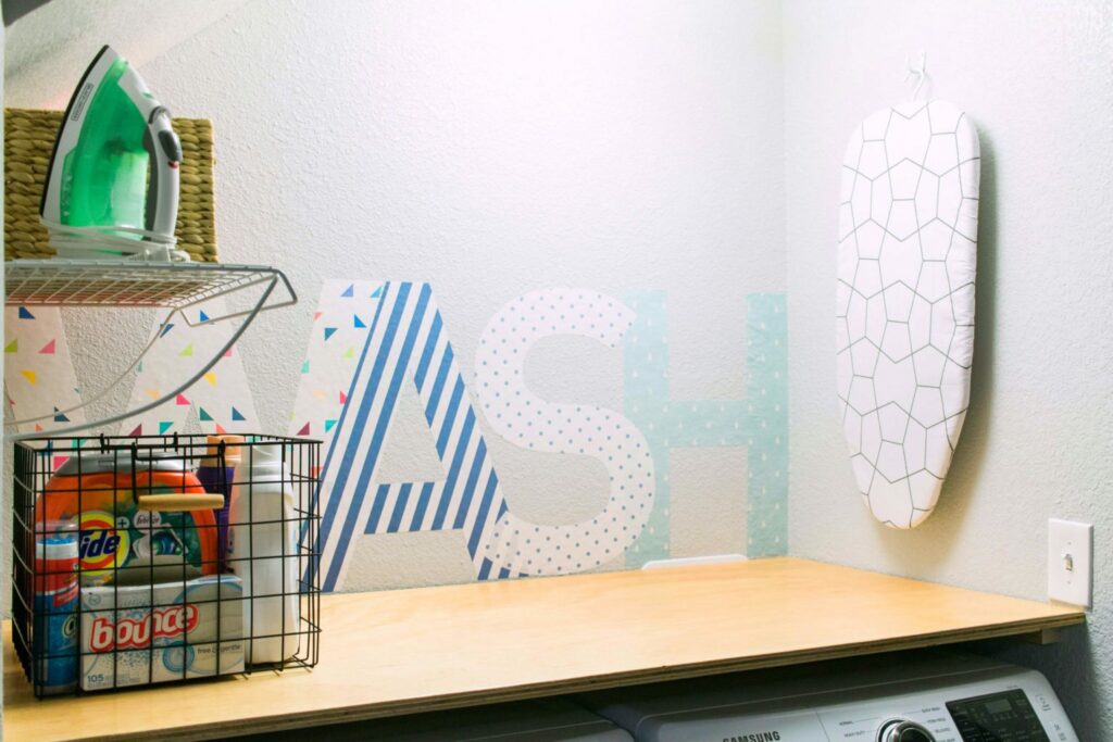 Our Tiny Laundry Room Reveal - You don't need to have a huge space to have a practical and beautiful laundry room! I love this closet laundry room! What a great use of a small space. Great idea for small laundry rooms! 