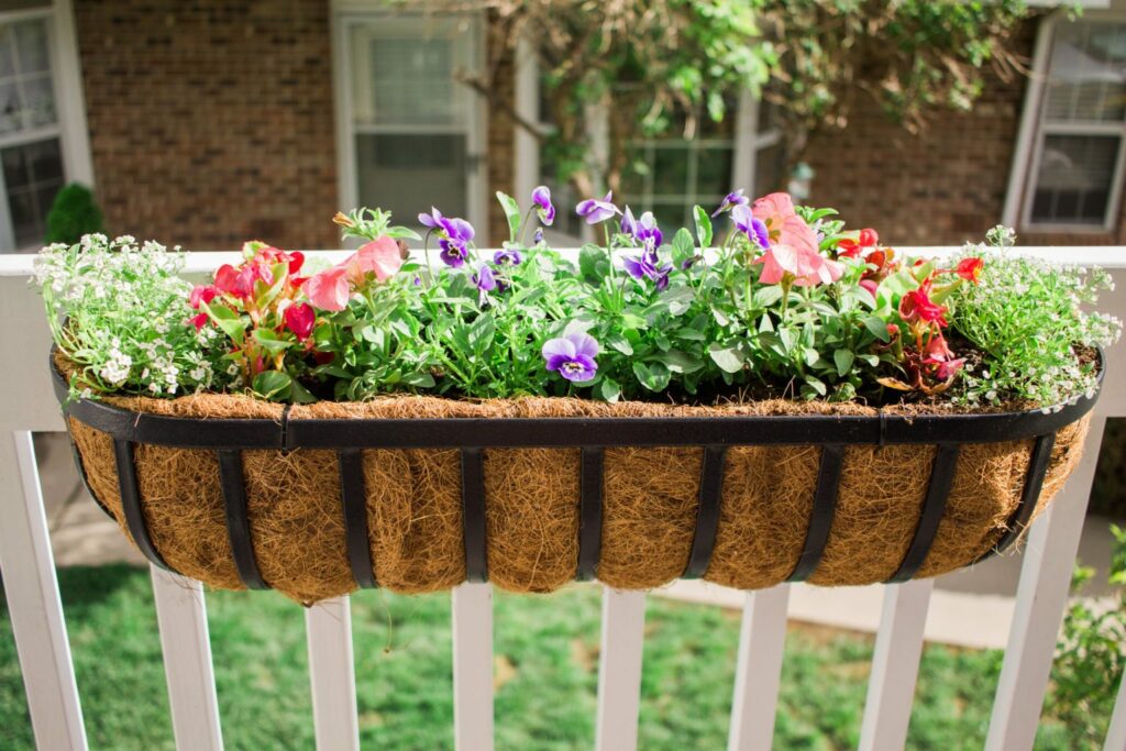 DIY Back Porch Garden that takes up little space but looks wonderful and adds so much life! Perfect for apartment, condo, and town home living! I love growing your own herbs! 