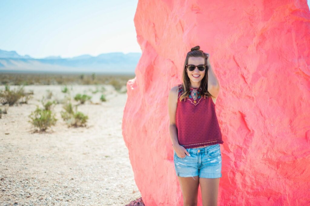 Love this fun neon desert style! That top is so perfect for hot summer!  location: seven magic mountains 