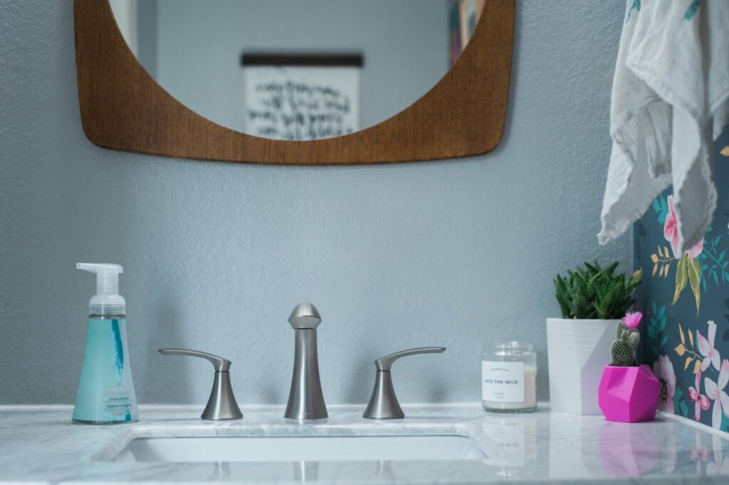 Guest Bathroom Reveal - We remodeled our guest bathroom and this before and after is so fun! 