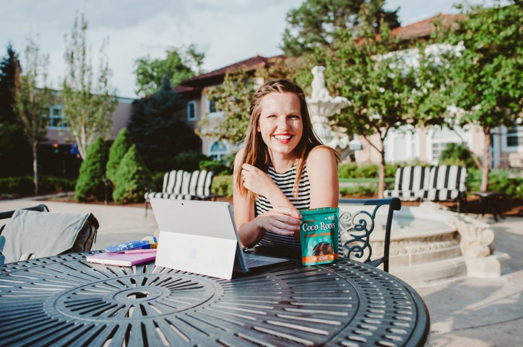 Girl Boss Elizabeth Mayberry of Oak + Oats working and snacking on Coco-Roons! 