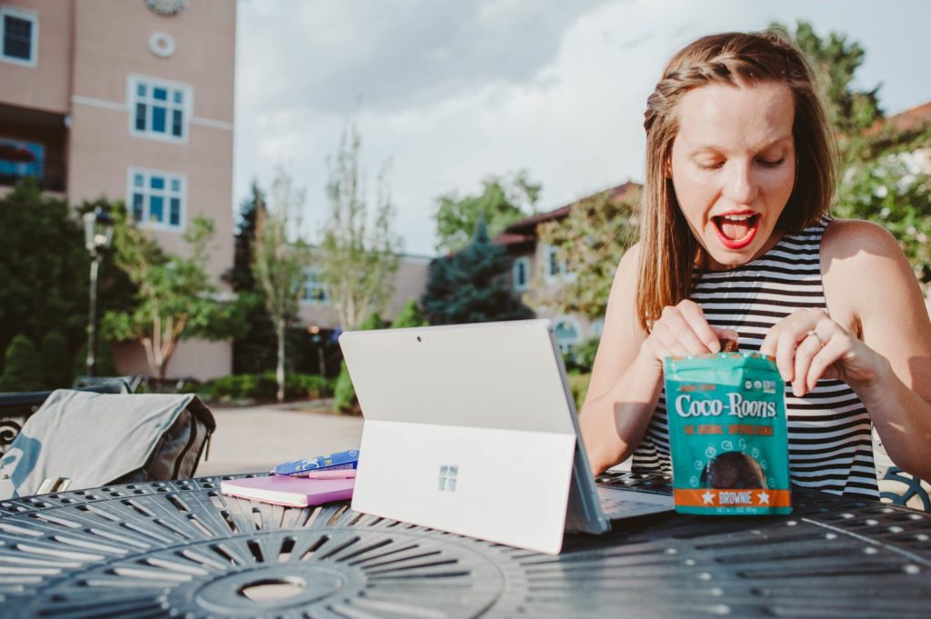 Girl Boss Elizabeth Mayberry of Oak + Oats working and snacking on Coco-Roons! 