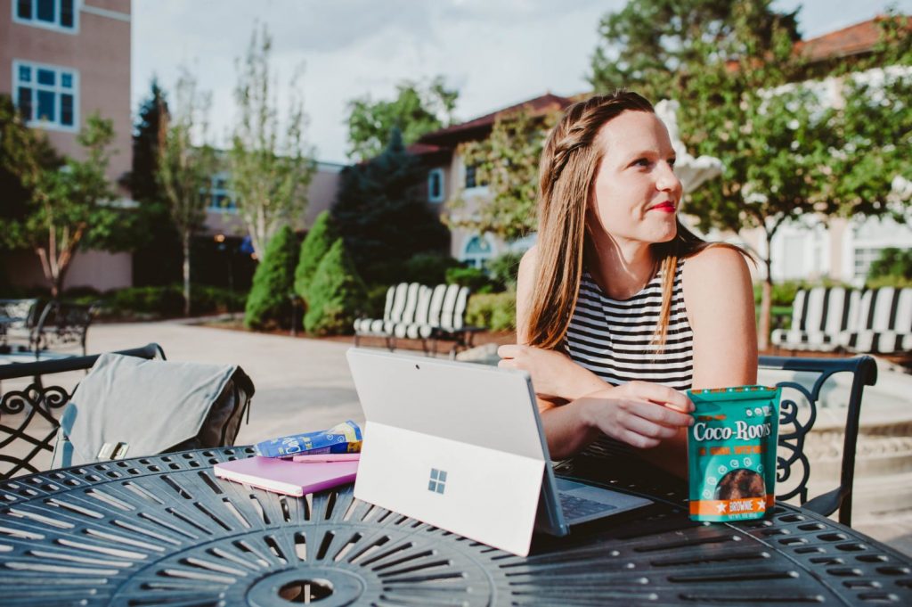 Girl Boss Elizabeth Mayberry of Oak + Oats working and snacking on Coco-Roons! 