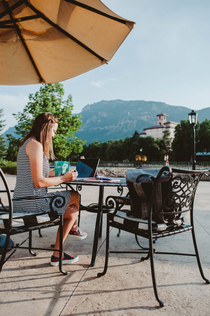 Girl Boss Elizabeth Mayberry of Oak + Oats working and snacking on Coco-Roons! 