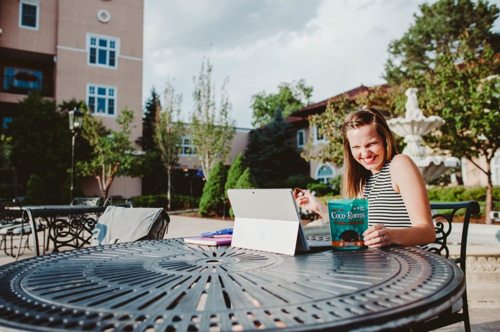 Girl Boss Elizabeth Mayberry of Oak + Oats working and snacking on Coco-Roons! 