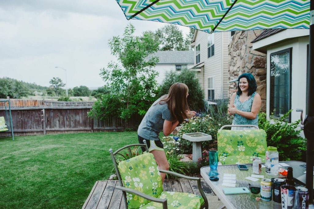 Elizabeth Mayberry of Oak + Oats playing Deer Lord! the party game! Plan a game night (or day) with your friends to build community!