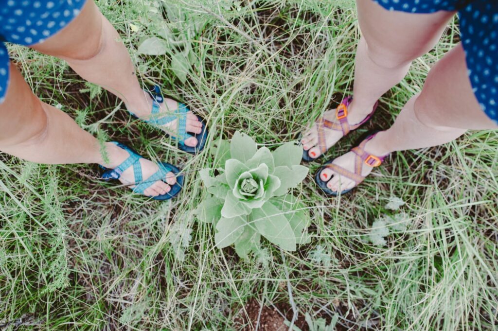 Elizabeth Mayberry Life Style Blogger at  Oak + Oats in Patagonia Shorts. Love the wildflowers and sunset.