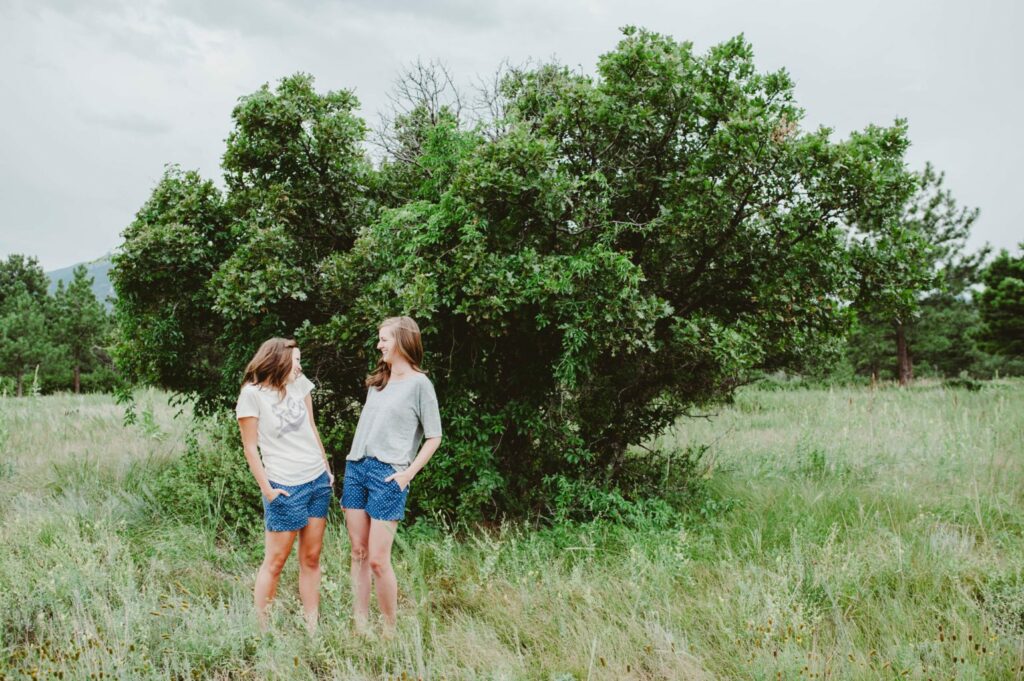 Elizabeth Mayberry Life Style Blogger at  Oak + Oats in Patagonia Shorts. Love the wildflowers and sunset.