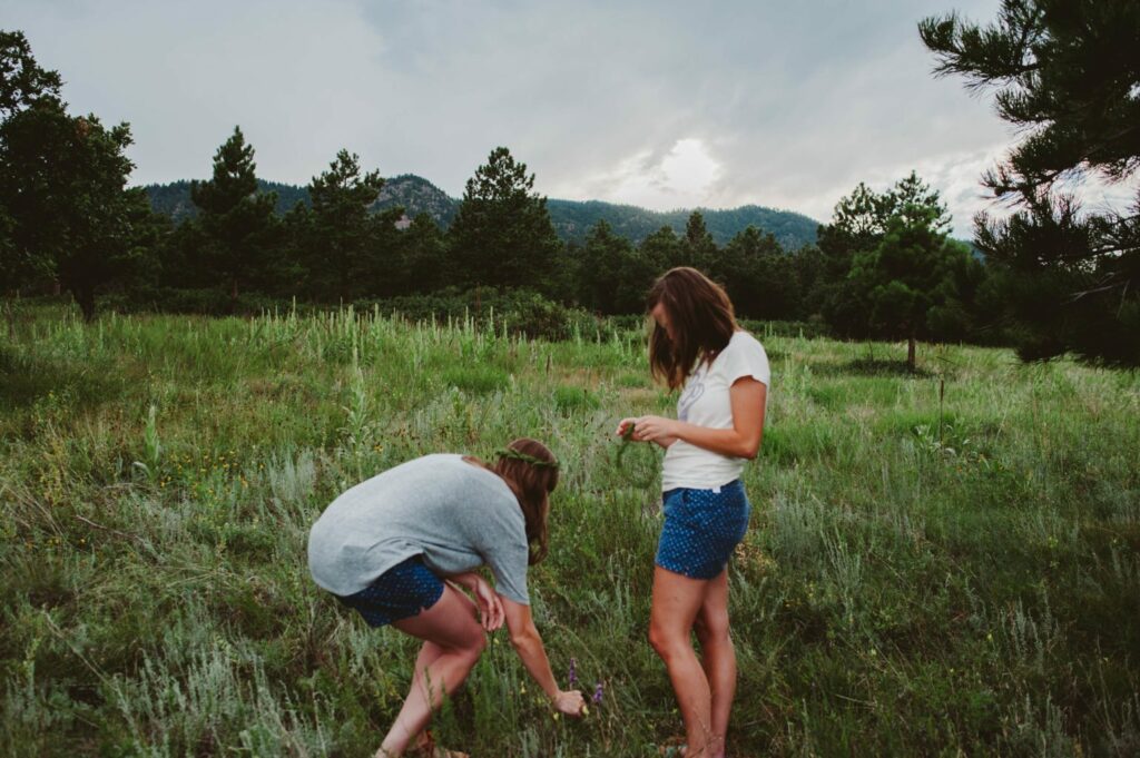 Elizabeth Mayberry Life Style Blogger at  Oak + Oats in Patagonia Shorts. Love the wildflowers and sunset.