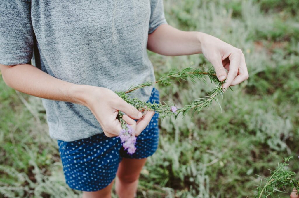 Elizabeth Mayberry Life Style Blogger at  Oak + Oats in Patagonia Shorts. Love the wildflowers and sunset.