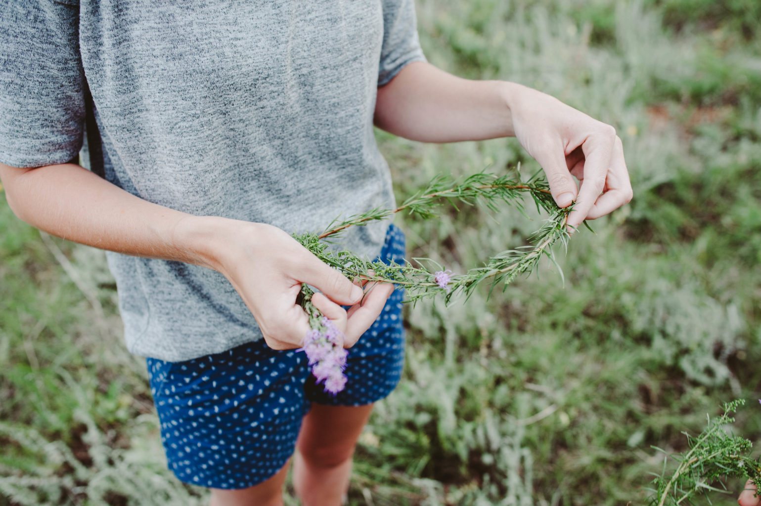 Elizabeth Mayberry Life Style Blogger at  Oak + Oats in Patagonia Shorts. Love the wildflowers and sunset.