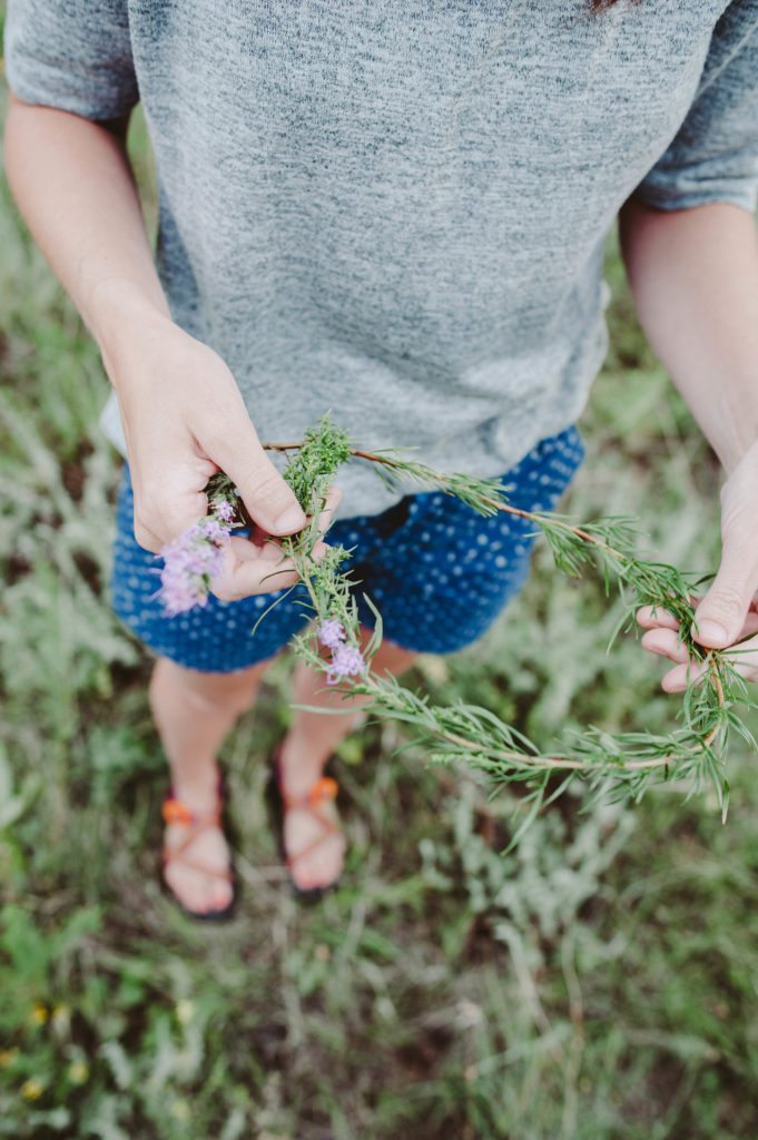 Elizabeth Mayberry Life Style Blogger at  Oak + Oats in Patagonia Shorts. Love the wildflowers and sunset.