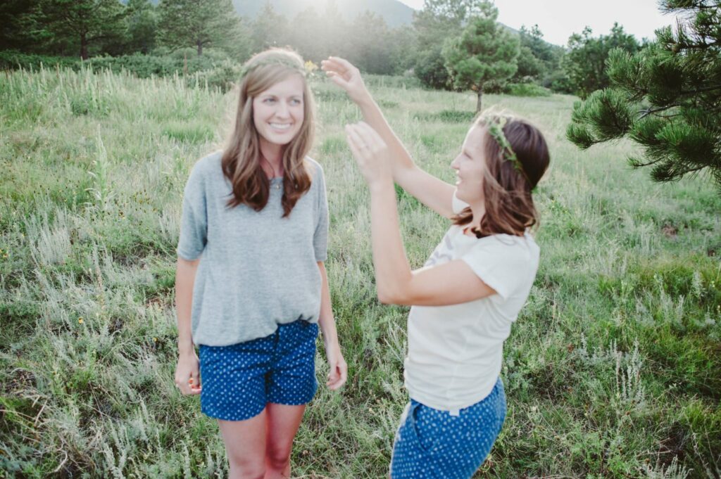 Elizabeth Mayberry Life Style Blogger at  Oak + Oats in Patagonia Shorts. Love the wildflowers and sunset.