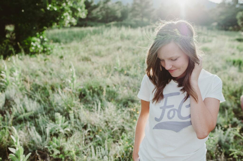 Elizabeth Mayberry Life Style Blogger at  Oak + Oats in Patagonia Shorts. Love the wildflowers and sunset.