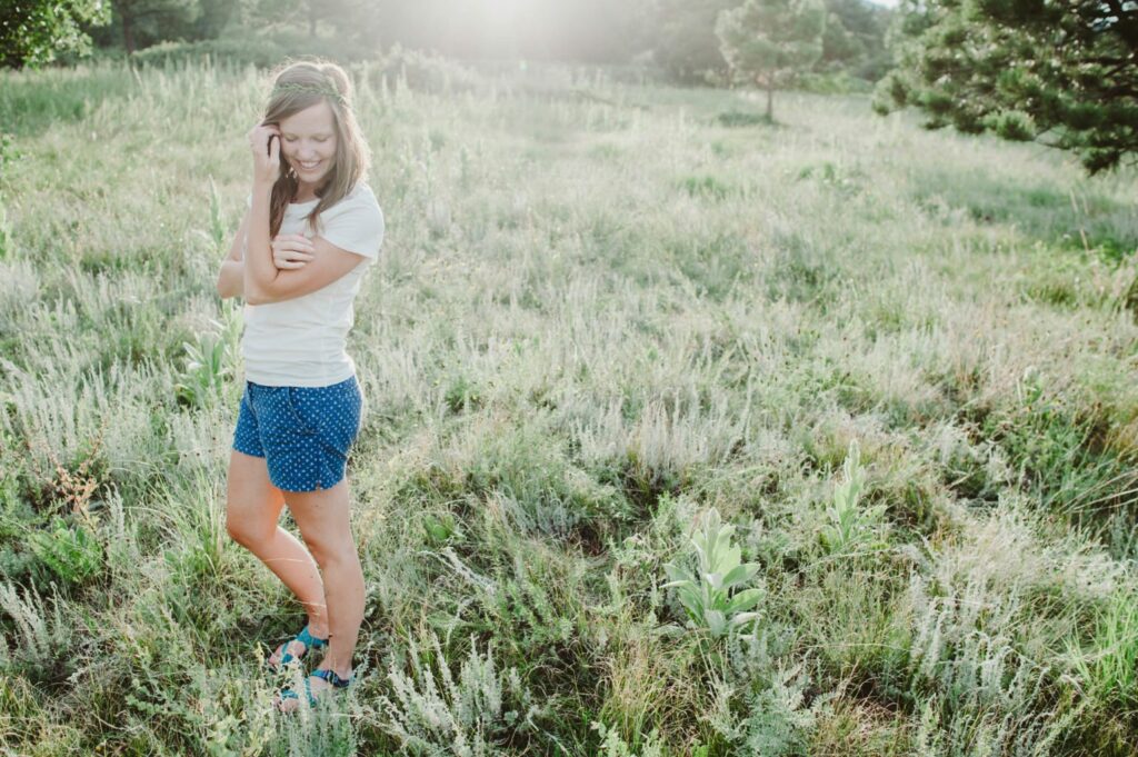 Elizabeth Mayberry Life Style Blogger at  Oak + Oats in Patagonia Shorts. Love the wildflowers and sunset.