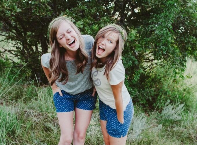 Elizabeth Mayberry Life Style Blogger at Oak + Oats in Patagonia Shorts. Love the wildflowers and sunset.