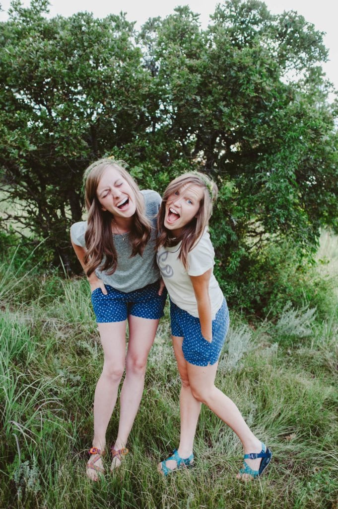 Elizabeth Mayberry Life Style Blogger at Oak + Oats in Patagonia Shorts. Love the wildflowers and sunset.