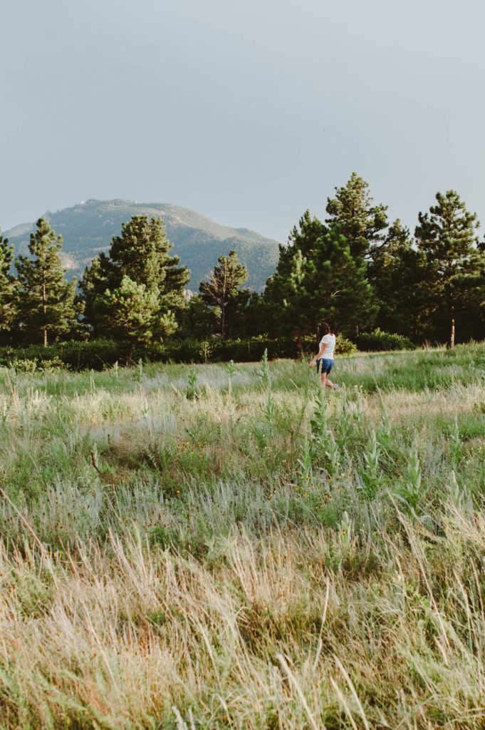Elizabeth Mayberry Life Style Blogger at  Oak + Oats in Patagonia Shorts. Love the wildflowers and sunset.